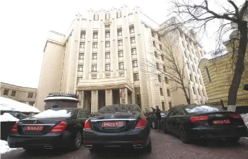 ??  ?? Cars of foreign ambassador­s are parked near the building of the Russian Foreign Ministry during a briefing, dedicated to the poisoning of former Russian double agent Sergei Skripal and his daughter, in Moscow, Russia. — Reuters photo