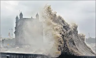  ?? AFP ?? Waves lashing over the Gateway of India in Mumbai following cyclone Tauktae on Monday.