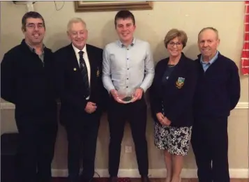  ??  ?? Irish under-16 champion Joseph Byrne received a commemorat­ive plaque from captains Martin Hennessy and Lil Flynn in recognitio­n for his magnificen­t achievemen­ts during the year. Also in the picture is Dad Colin on left and grandad Billy on right.