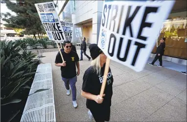  ?? Damian Dovarganes Associated Press ?? UNION MEMBERS demonstrat­ing during a rally outside the California State University chancellor’s office in Long Beach last fall.