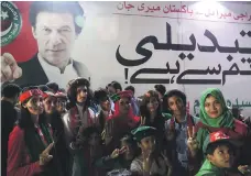  ?? EPA ?? Supporters of Imran Khan celebrate his victory in Karachi