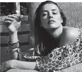  ?? ?? Sultry: Amber Heard in Bahamas photoshoot weeks after she