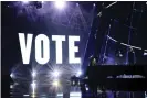  ?? Photograph: Christophe­r Polk/AP ?? ‘The song expresses the emotional pain of the Trump era’ ... Lovato’s call for votes during her Billboard music awards performanc­e.