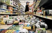  ?? JESSIEWARD­ARSKI/TULSA (OKLA.) WORLD ?? A store in Pawnee, Okla., near the epicenter of a Saturday morning quake, is left to clean up after the shaking.