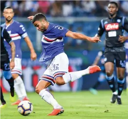  ?? — AP ?? Sampdoria’s Gregoire Defrel scores against Napoli in their Serie A match at the Luigi Ferraris Stadium in Genoa on Sunday. Sampdoria won 3- 0.