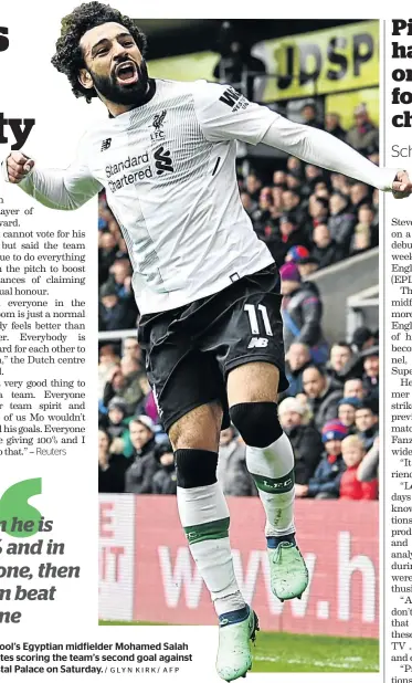  ?? / GLYN KIRK/ AFP ?? Liverpool’s Egyptian midfielder Mohamed Salah celebrates scoring the team’s second goal against Crystal Palace on Saturday.