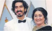  ?? PHOTO:MIKE BLAKE/ RETUTERS ?? Dev Patel’s plus one person at the event was his mother Anita Patel