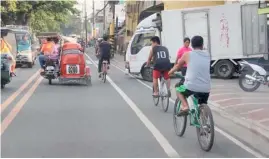  ?? PHOTOGRAPH COURTESY OF MARIKINA PIO ?? MARIKINA City is one of the firsts in the National Capital Region to allocate bicycle lanes on its streets.