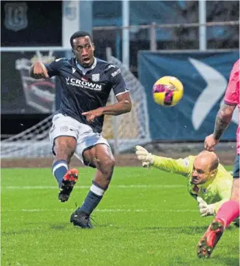  ?? ?? Double trouble as Robinson scores to make it 2-0 and give the Dark Blues a cushion.