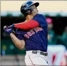  ?? Tony Avelar / Associated Press ?? Boston's Rafael Devers watches his RBI double against Oakland on Friday. The game ended too late for this edition. For a complete story, go to timesunion.com.