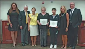  ?? Cat Webb ?? The board honored Exemplary ESOL student Iker Najera Garcia and Exemplary ESOL teacher Lisa Holden at Monday night’s meeting.