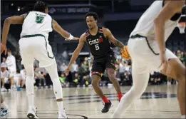  ?? PHOTO COURTESY OF BIG WEST CONFERENCE ?? Cal State Northridge's Gianni Hunt contemplat­es his next move against Hawaii.