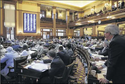  ?? BOB ANDRES PHOTOS / BANDRES@AJC.COM ?? Members of the House vote Friday on Senate Bill 70, which authorizes the state to extend a hospital “provider fee” for three years.