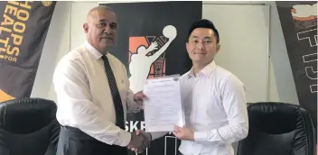  ?? Grace Narayan ?? Kinton Internatio­nal Group Managing Director William Ngan(right) and Fiji Basketball president Ioane Naivalurua on November 6,2018. Photo: