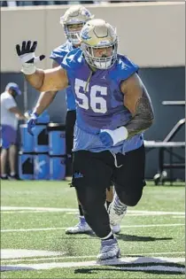  ?? Sam Lazarus UCLA ?? FIFTH-YEAR senior offensive lineman Atonio Mafi of UCLA has shed 70 pounds and now tips the scales at 340 pounds.