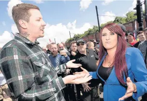  ??  ?? ●●Professor Green talking to Britain First deputy leader Jayda Fransen during their rally in Rochdale in July last year