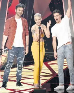  ?? FILE ?? In this March 2017 file photo, Alex Pall, left, and Drew Taggart, right, of the Chainsmoke­rs, and Halsey accept the award for dance song of the year for ‘Closer’ at the iHeartRadi­o Music Awards.
