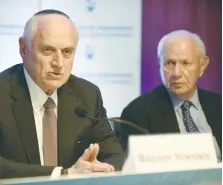  ?? (Avi Hayoun) ?? MALCOLM HOENLEIN speaks as Stephen M. Greenberg listens at a press conference before the opening of the Conference of Presidents Leadership Mission to Israel yesterday in Jerusalem.