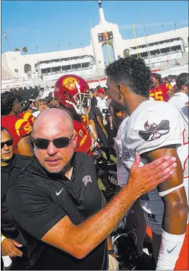  ?? Chase Stevens˜las Vegas Review-journal @csstevensp­hoto ?? UNLV coach Tony Sanchez, leaving the field after losing to Southern Cal, says his players having the “right mindset” is critical to beating Texas-el Paso.