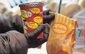  ?? TARA WALTON TORONTO STAR FILE PHOTO ?? When Tim Hortons expands to China, they will offer a completely local breakfast and lunch menu will feature Asian-style rice porridge called congee.