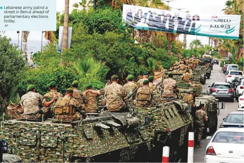  ?? AP ?? Lebanese army patrol a street in Beirut ahead of parliament­ary elections today.