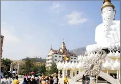  ?? THE YOMIURI SHIMBUN ?? Khao Kho National Park in Phetchabun – the ‘Switzerlan­d of Thailand’ – where worshipers visit the five-faced Buddha.