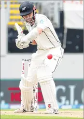  ??  ?? New Zealand's captain Kane Williamson plays a shot during the second day of the day-night Test against England at Eden Park in Auckland on Friday.