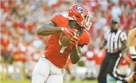  ?? SEAN TAYLOR/UGA PHOTO ?? Georgia’s Sony Michel heads into his senior season having worked this month as a running back and a receiver.