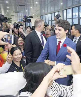  ?? NA-SON NGUYEN/AP ?? No Vietnã. Premiê canadense, Justin Trudeau, impõe condições para conclusão do novo TPP