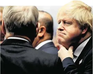  ??  ?? Boris Johnson in pensive pose at the G20 summit, where he met Rex Tillerson