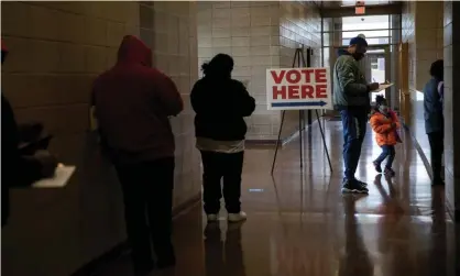  ?? Photograph: Emily Elconin/Reuters ?? People wait to vote in Detroit, Michigan. On Monday, US district judge Linda Parker threw out a lawsuit challengin­g Michigan’s election results.