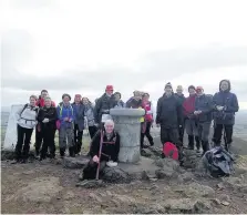  ??  ?? Scenic treks Duncanrig Ramblers by the River Tweed, top, and the high group at Eildon Hill summit, above