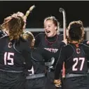  ?? JOHN GILLIS/FOR BALTIMORE SUN MEDIA ?? Crofton’s Kylie Corcoran, center, celebrates with teammates after scoring during Wednesday’s Class 3A state semifinal.