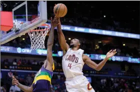  ?? MATTHEW HINTON — THE ASSOCIATED PRESS ?? Evan Mobley blocks a shot by the Pelicans’ Naji Marshall during the Cavs’ victory Feb. 10.