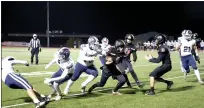  ?? Guy Mccarthy
/ Union Democrat ?? Braylon Leveroos (3) of the Summervill­e Bears turns upfield against the Esparto Spartans during a varsity football playoff game Friday night atthorsted Field intuolumne.