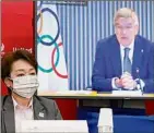  ?? Rodrigo Reyes Marin / Associated Press ?? Tokyo 2020 president Seiko Hashimoto, left, and IOC president Thomas Bach meet online in June.