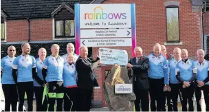  ??  ?? Pictured is the provincial grand master David Hagger presenting cheque for £11,704 to Rainbows CEO, David Strudley. Photo taken by Carl Hudson.