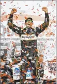  ?? AP photo ?? Aric Almirola celebrates in victory lane after winning the 1000Bulbs.com 500 on Sunday.