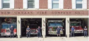  ?? Andrea Ceraso / Contribute­d photo ?? A photo of the New Canaan Fire Department that was part of the Front Step Project, by Andrea Ceraso, has been chosen for a book documentin­g the early COVID effort to record people at their homes and businesses.