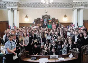  ??  ?? Stockport pupils who took part in the mock UN debate at the town hall