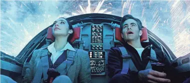  ??  ?? Diana (Gal Gadot) reconnects with Steve Trevor (Chris Pine) in “Wonder Woman 1984.”