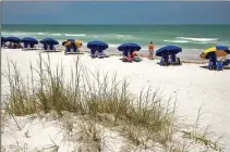  ?? (File Photo/ AP/Craig Litten) ?? The main beach at Caladesi Island State Park, a barrier island along the Gulf of Mexico, on Florida’s West Coast is seen May 21, 2008.