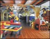  ??  ?? The design of the new Castle Hotel blends Lego-building artistry, whimsy and a generous dash of humor.