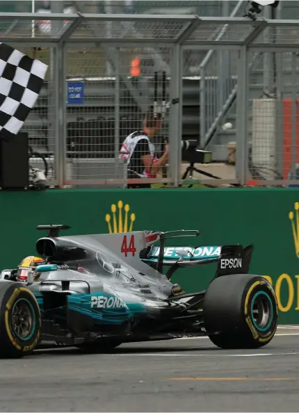  ??  ?? Lewis Hamilton led a 1-2 finish for MercedesGP with teammate Valtteri Bottas 14 seconds behind him in second
