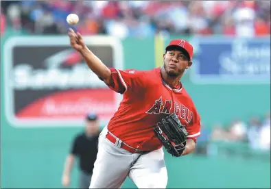  ?? USA TODAY SPORTS ?? JC Ramirez, of the Los Angeles Angels, tosses a pitch during the first inning against the Boston Red Sox at Fenway Park on Saturday. Ramirez produced six solid innings as the Angels won 6-3.