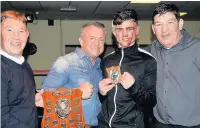  ??  ?? ●●Darren Connellan, Brian Kelly, Harry Bills and Tony Connellan presenting the Johnny Butterwoth Shield for Boxer of the night