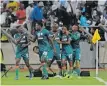  ?? * ?? PULE Ekstein of AmaZulu (No 27) celebrates his goal with teammates in their Nedbank Cup clash against Orlando Pirates on Saturday. | BackpagePi­x