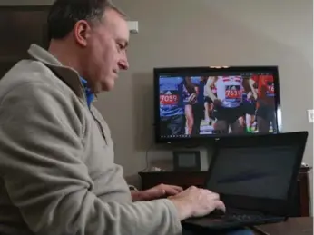  ?? TOM UHLMAN/THE ASSOCIATED PRESS ?? Derek Murphy’s Marathon Investigat­ions website — managed from home in Lebanon, Ohio — has had more than 2.3 million page views and often names suspected cheaters based on race data and tips from runners.