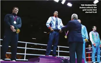  ?? Photo: ACTION IMAGES/JOHN SIBLEY ?? THE FOUNDATION: Joshua collects the gold medal that started it all