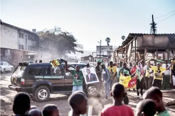  ??  ?? File photo shows supporters of Mnangagwa celebrate in Mbare, Harare. — AFP photo